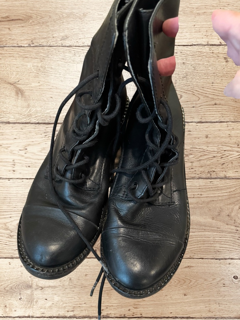Kendall + Kylie black lace-up combat boots in women’s size 7.5M.